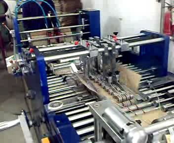 伊寧國標(biāo)品質(zhì)塑料制品 手機(jī)貼膜紙卡、紙袋與包裝盒制造機(jī)器一站式解決方案